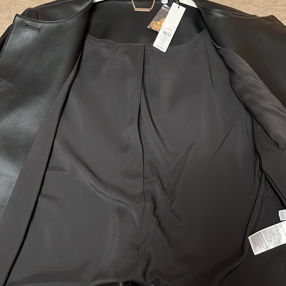 Chico's Black faux Leather Jacket with Gold Buttons
NWT , size 1 (8) - Picture 2 of 3